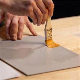 Apply a thin layer of transfer medium.