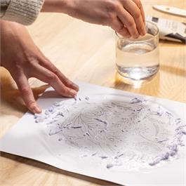 Moisten the surface lightly and rub gently to peel off.