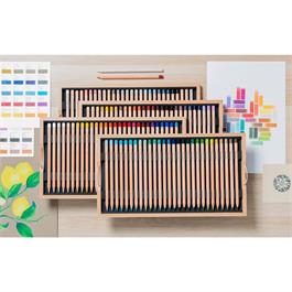 Luminance 100 wooden box showing layered trays of pencils
